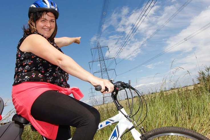 Cyclist Laura Pike has a shock from a pylon along Sheppey Way every time she leaves the village