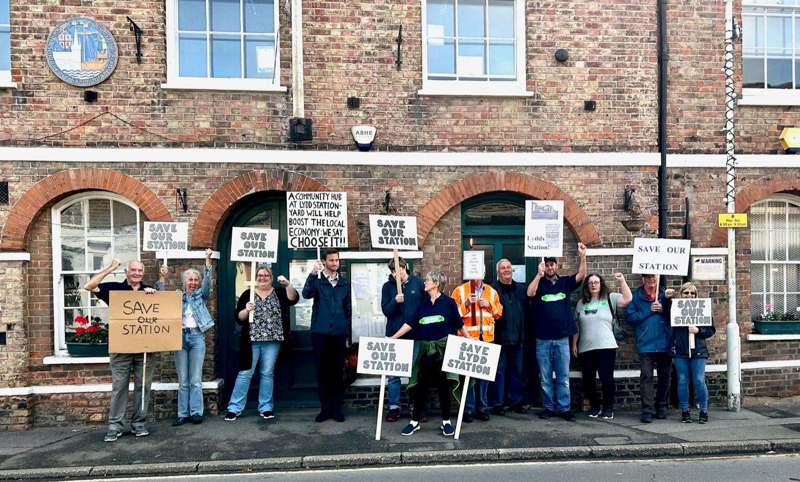 Lydd Station Heritage Group members protested on Friday against plans for the derelict station to be turned into a park home site. Picture: Anita Spence