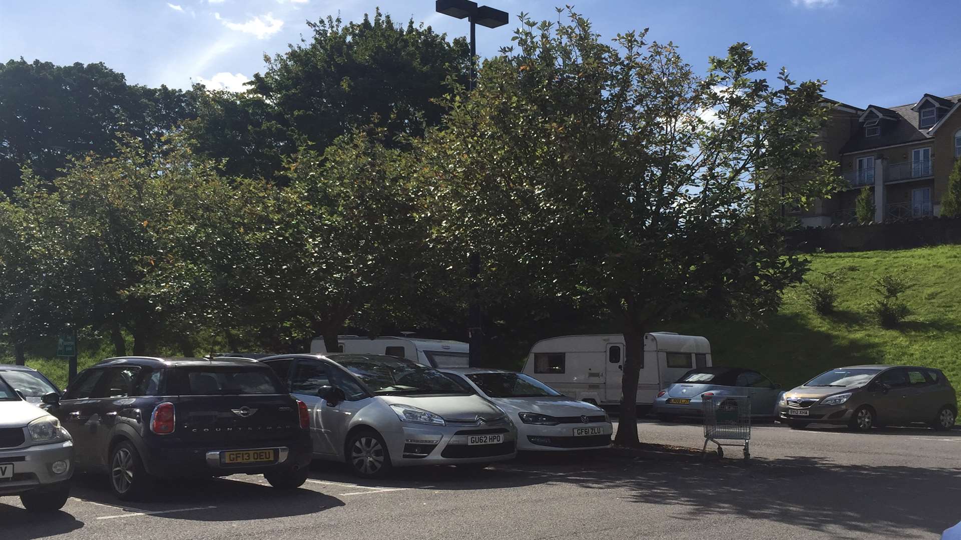 Travellers in the car park
