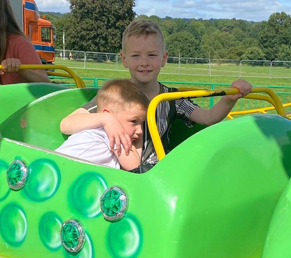 Brothers Jacob and Oscar Musselbrook from Rochester after having their hair cut