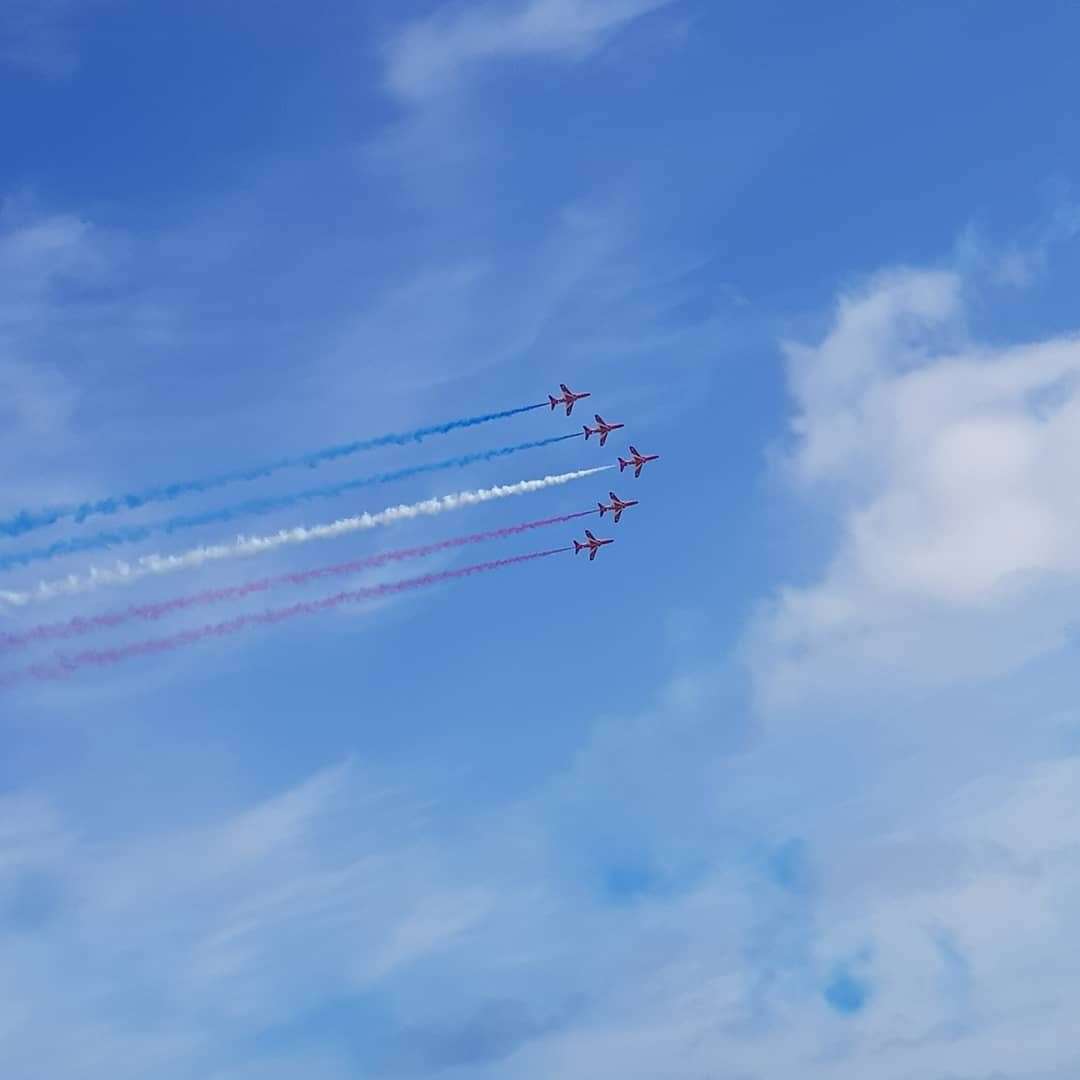 The iconic red, white and blue vapour trails from the jets. Picture: Emma Kennett