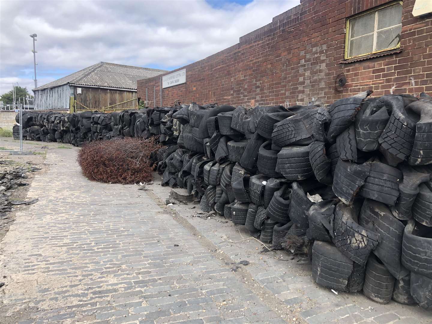 The wall of tyres at the Canal Basin has disappeared but the mountain remains. Picture from August