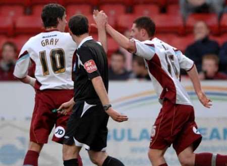 GOALSCORERS: Chris McCann (right) and two-goal Andy Gray celebrate putting Burnley 2-0 up early on. Picture: BARRY GOODWIN