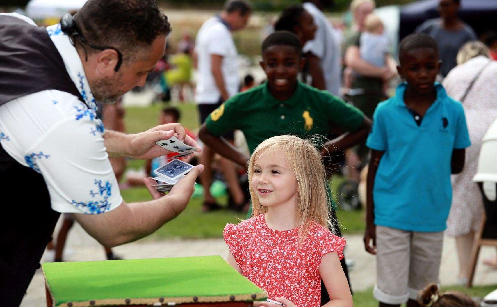 Younger visitors were wowed by magic acts. Picture: Cohesion Plus