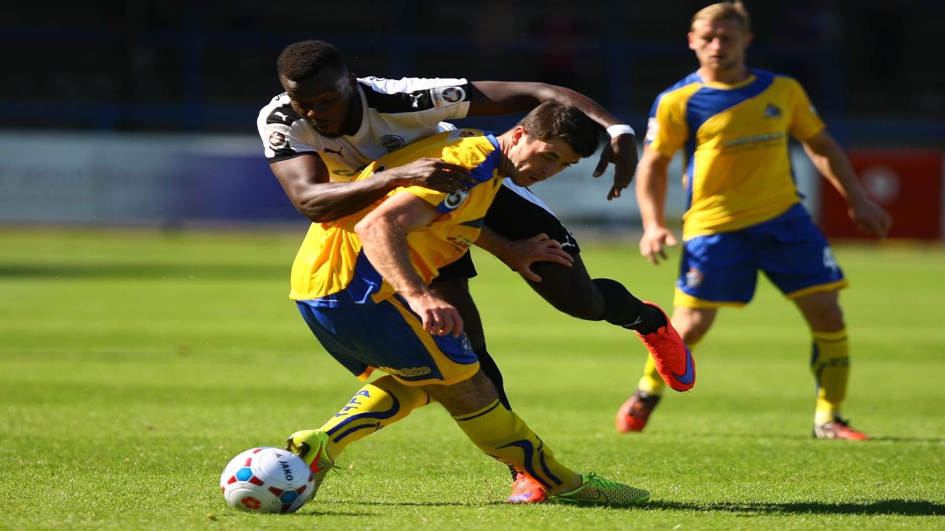 Duane Ofori-Acheampong battles for the ball against Altrincham at Crabble Picture: Matt Bristow