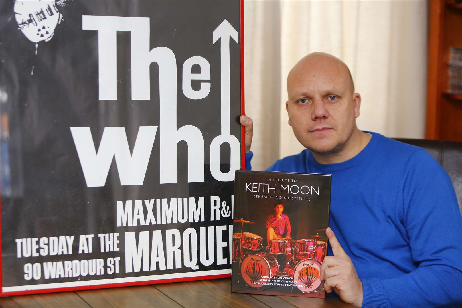 Author Ian Snowball, with a copy of his latest book, A Tribute To Keith Moon.