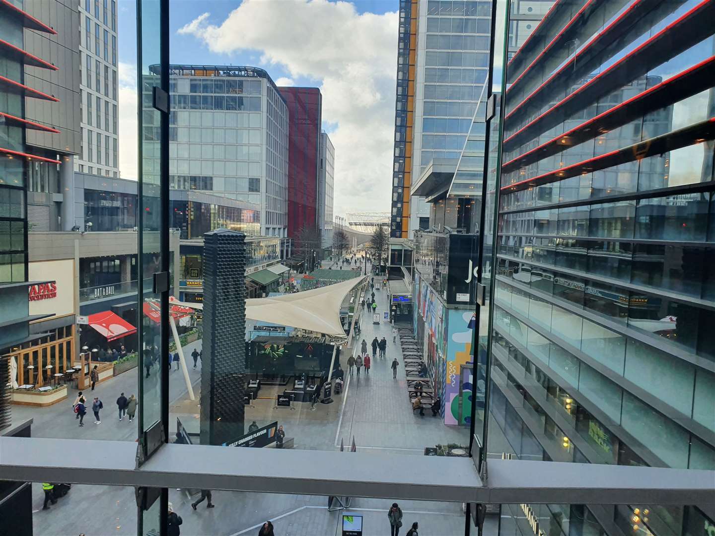 Part of the London Stadium is visible from inside Westfield Stratford City