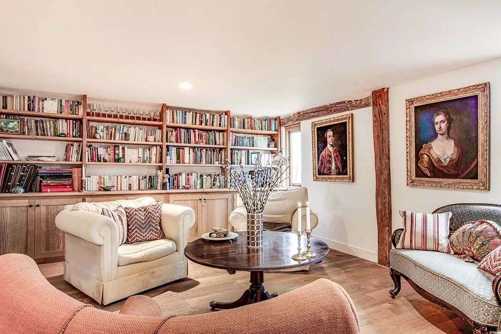 Bookworms will love the home's library. Picture: Your Move