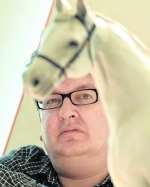 Mark Wallinger with his white horse design.