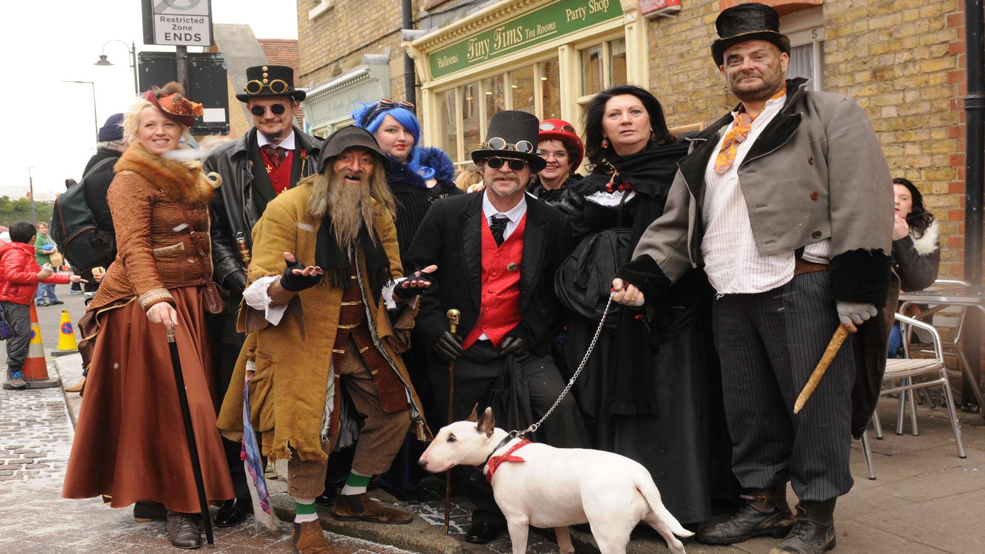 Fagin, Bill Sykes and Bull's Eye with other Dickensian characters.