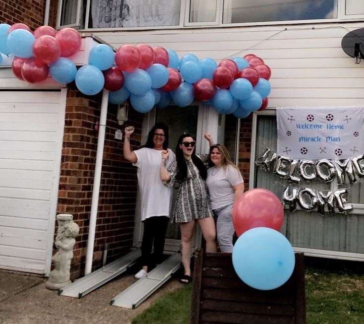 The family adorned the house with balloons and banners