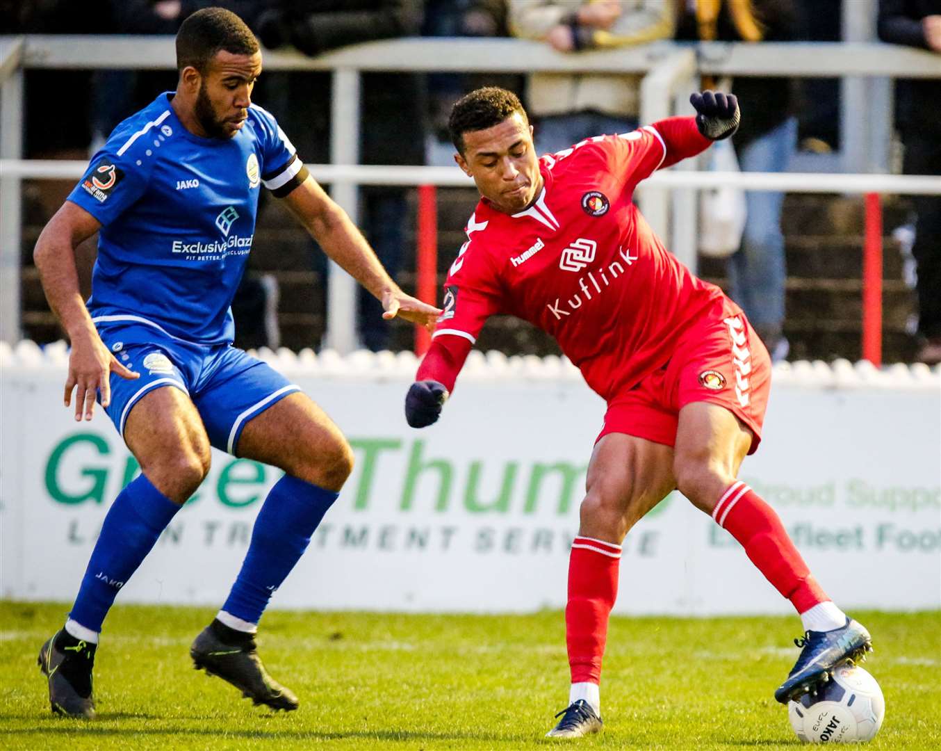 Dover captain Kevin Lokko keeps tabs on Ebbsfleet's Alex Reid on Saturday. Picture: Matthew Walker FM25358514