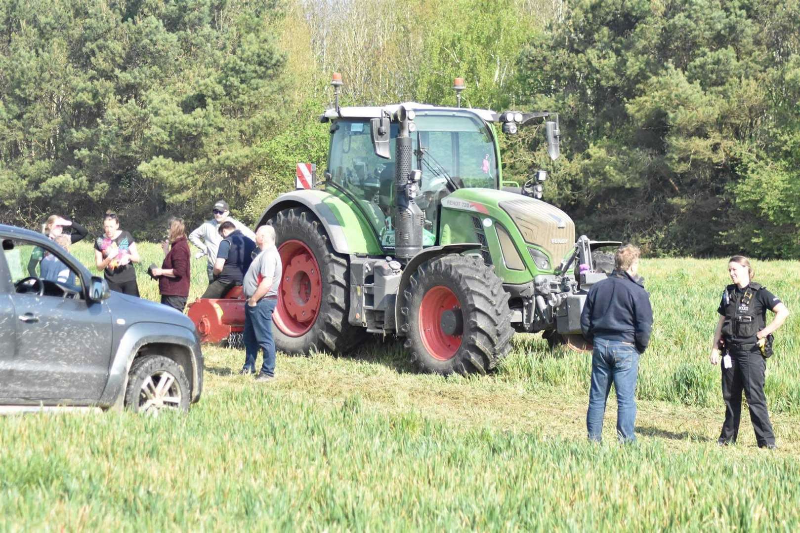 Police speak to the landowner of a field in Borden which protesters say had nesting skylarks. Picture: Vivien Smith