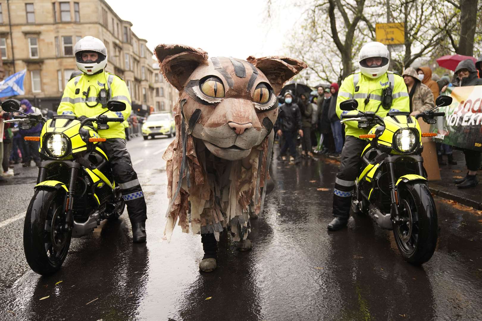 Protesters wore costumes to march through Glasgow (Danny Lawson/PA)