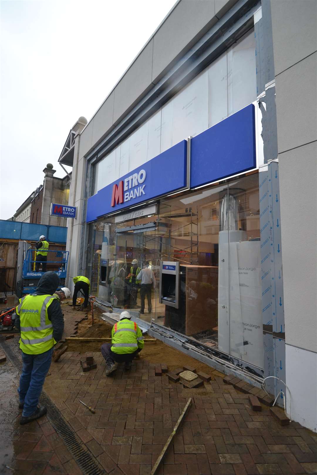Putting the finishing touches on the bank's exterior. Picture: Steve Salter (5868382)