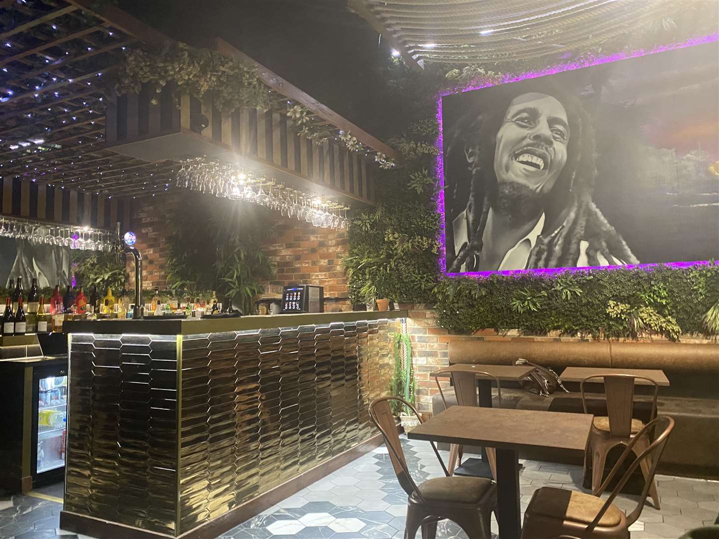 A huge mural of Bob Marley is looking down on the restaurant and bar which also serves a range of rums from around the world