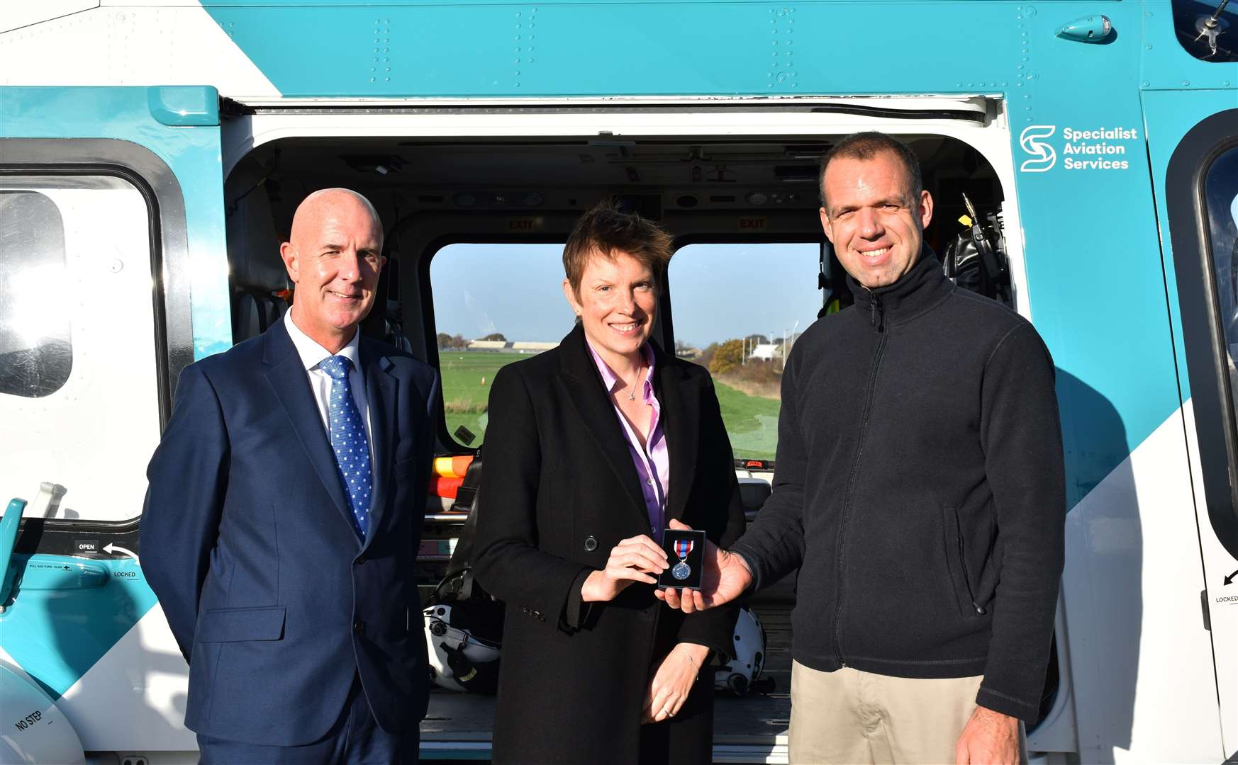 Chatham and Aylesford MP Tracey Crouch presented KSS air ambulance staff with Queen's Platinum Jubilee medals. Picture: KSS Air Ambulance