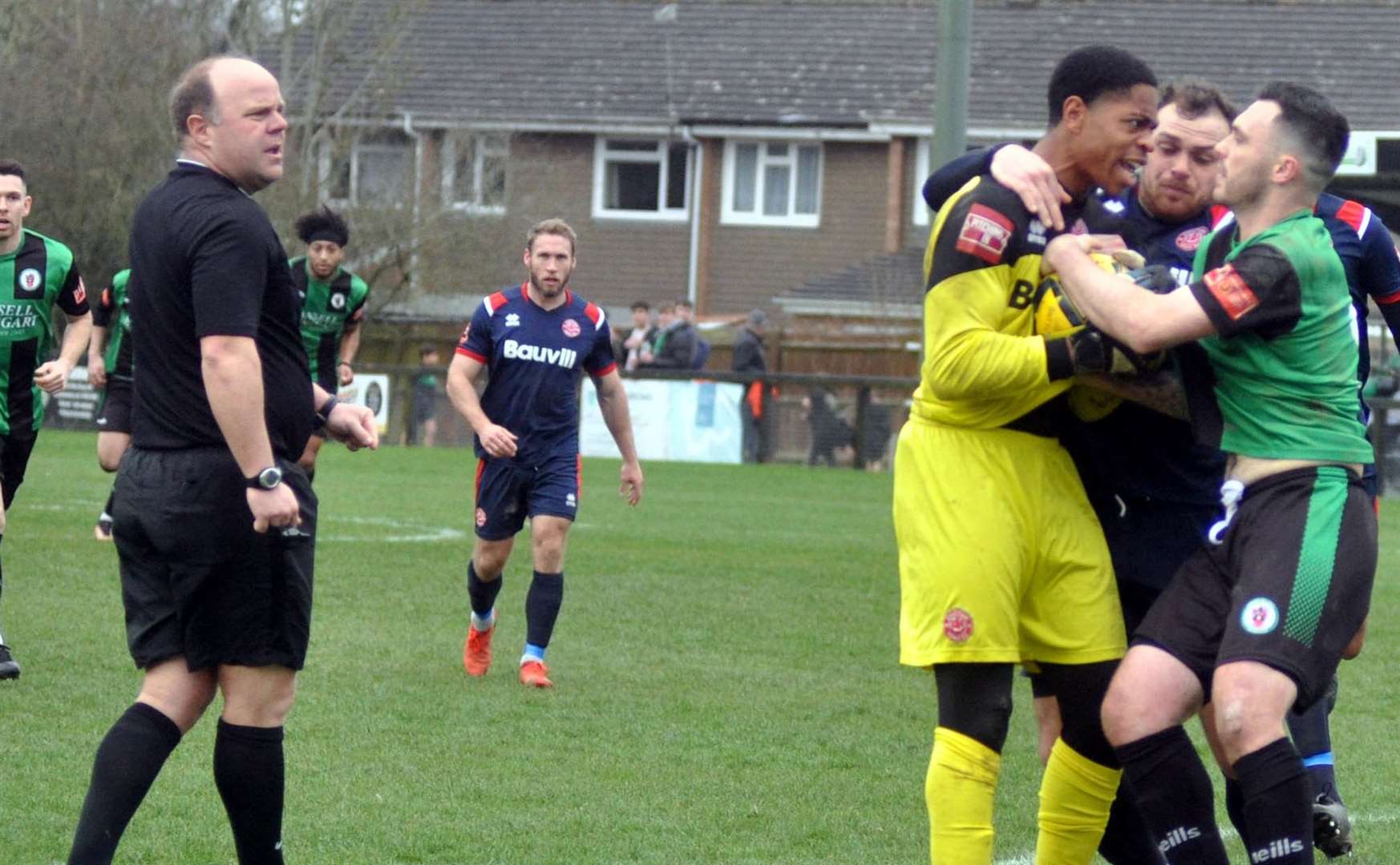 Chatham goalkeeper Nathan Harvey is sent off in their win at Burgess Hill after this scuffle. Picture: Phillip Dennett