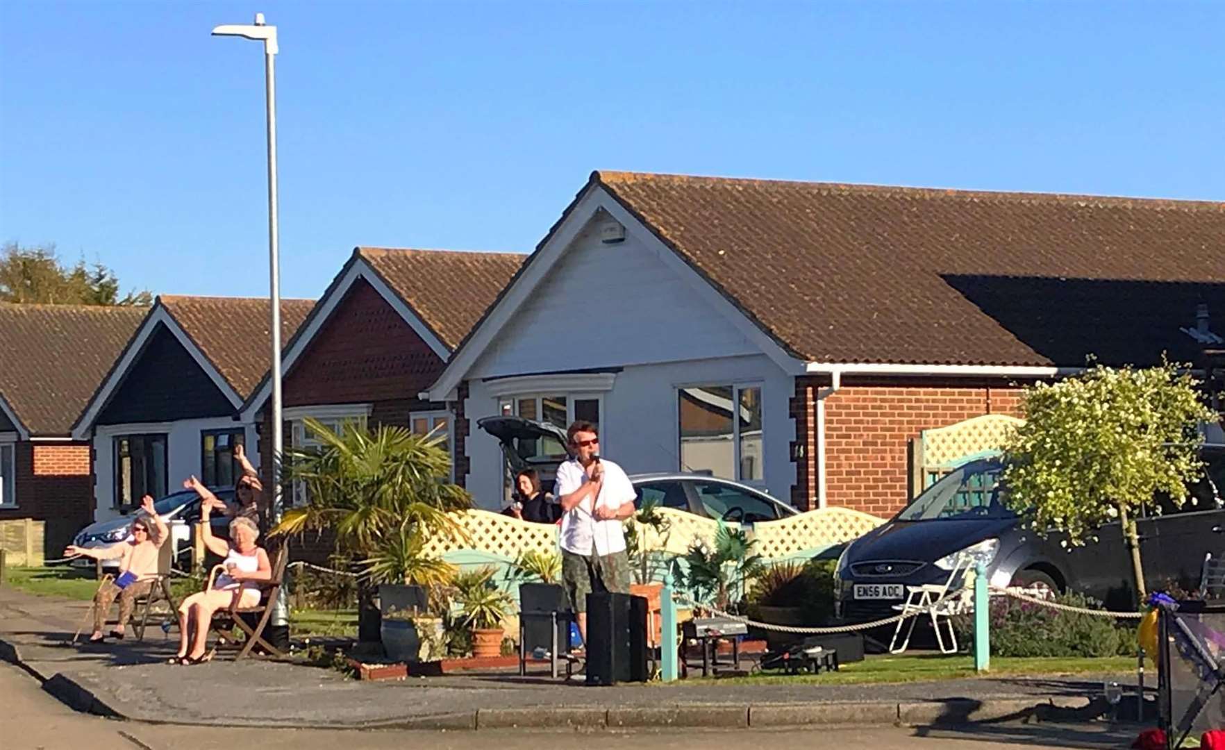 Neil Duncan sang to residents in his street. Picture: Kay Boyson