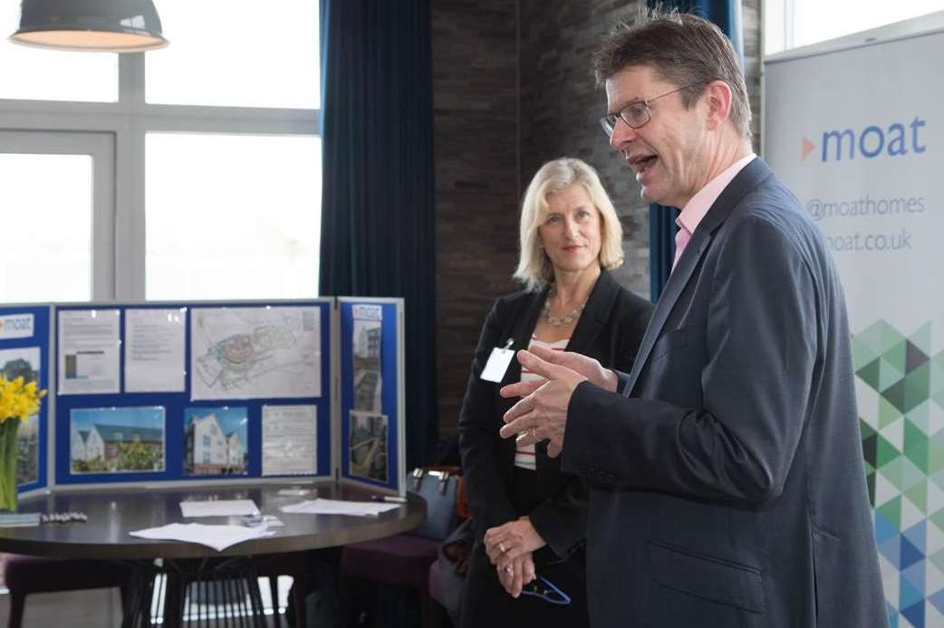 Greg Clark at the opening, watched by Liz McMeikan, chairman of the Moat housing association