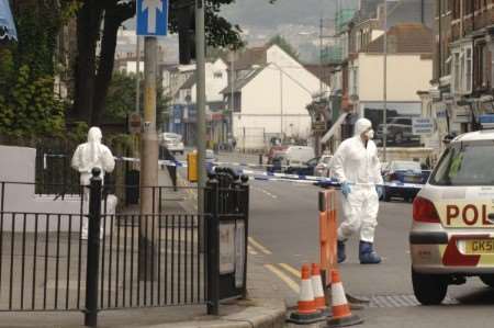 Forensic officers at the scene of the stabbing