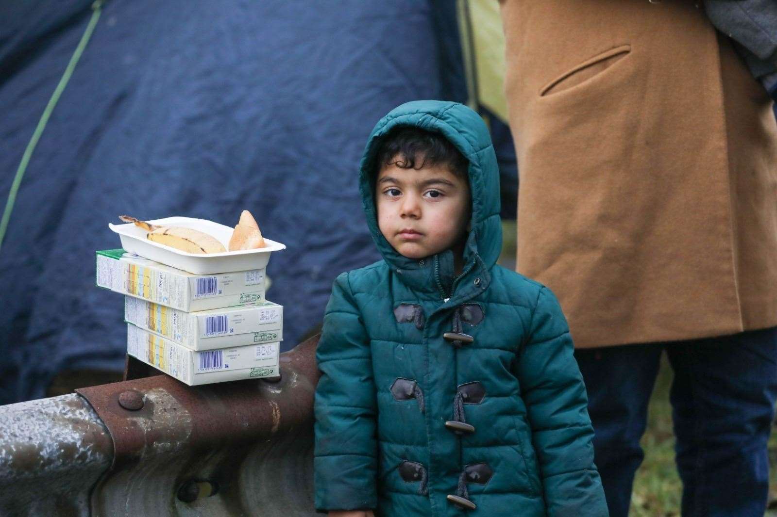 A child asylum seeker in Calais Picture: UKNIP