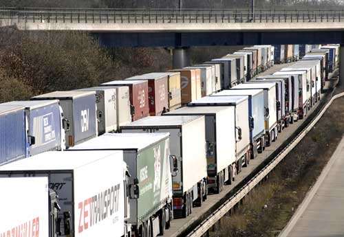 A semi-permanent lorry park would be designed to end scenes like this as freight traffic queues at junction 9 of the M20 on Wednesday. Picture: GARY BROWNE