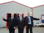 Deputy Lord Lieutenant John Ogden officially opens the new Wavecrest warehouse flanked by directors Geoff Watson, left, and Glen Humble