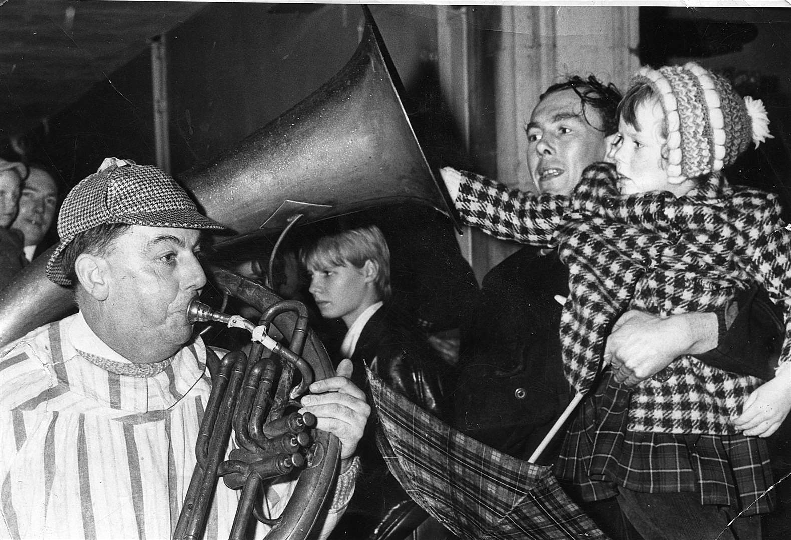 The well known figure of Joe Fagg plays a trombone at Children s Day in 1964