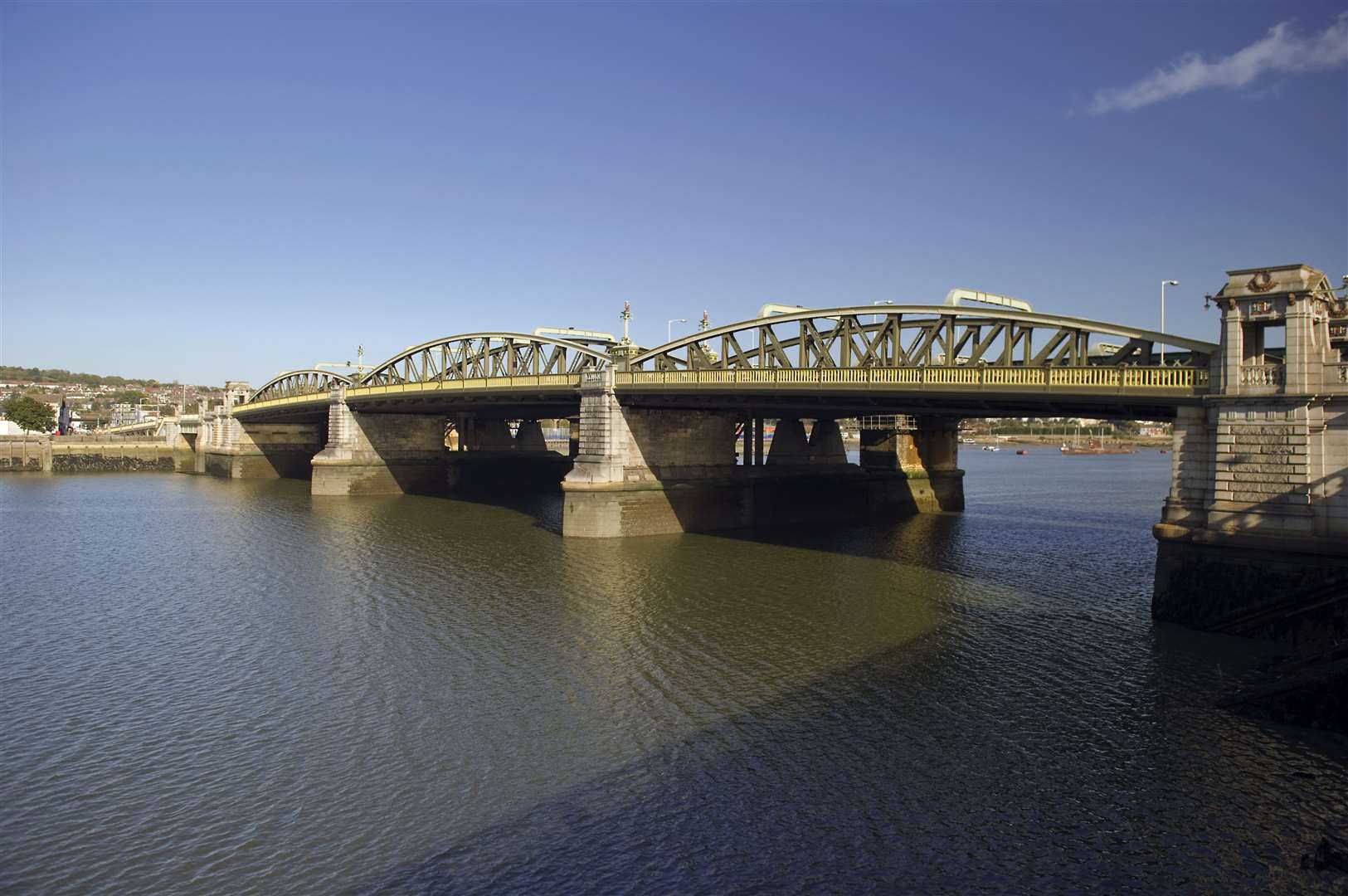 The Old Bridge crossing the Medway at Rochester. It was originally opened in 1856 but needed drastic repairs by 1909 and was rebuilt and reconstructed and opened again in May 1914