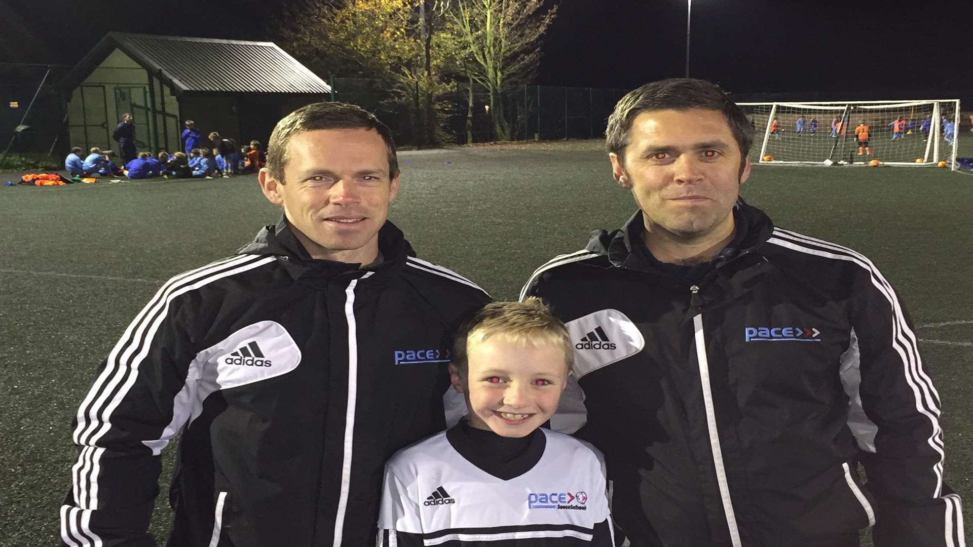 Ricky Owen (left) and Pat Sutcliffe, directors at the Pace Academy and Pace Soccer Schools with Josh Bayliss, who has been signed for Gillingham