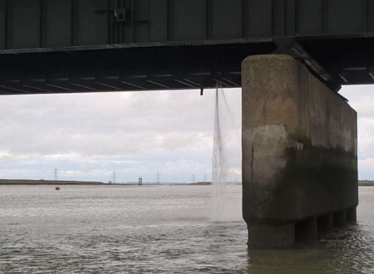 Water main leak under the Kingsferry Bridge showering water into The Swale in 2017