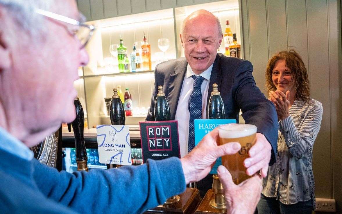 MP Damian Green served the first pint at The George in Bethersden. Picture: Greg Allen Photo