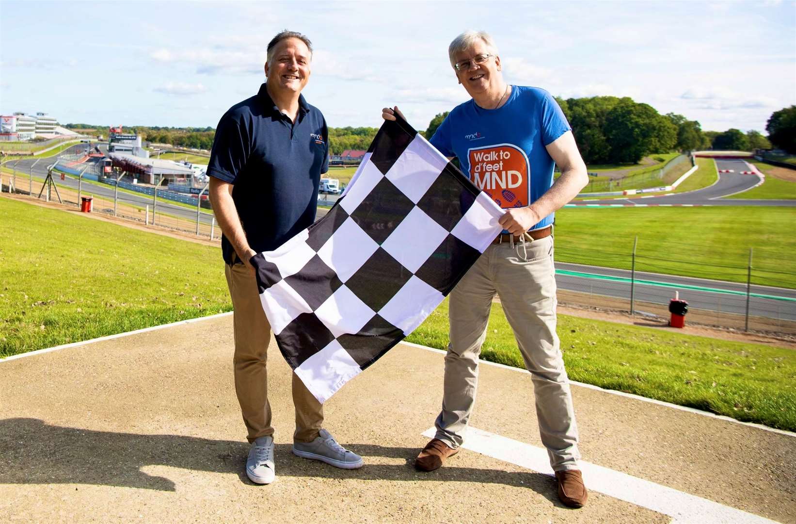 Richard Parris, corporate development manager at the MND Association, with fundraising organiser David Ward at Brands Hatch