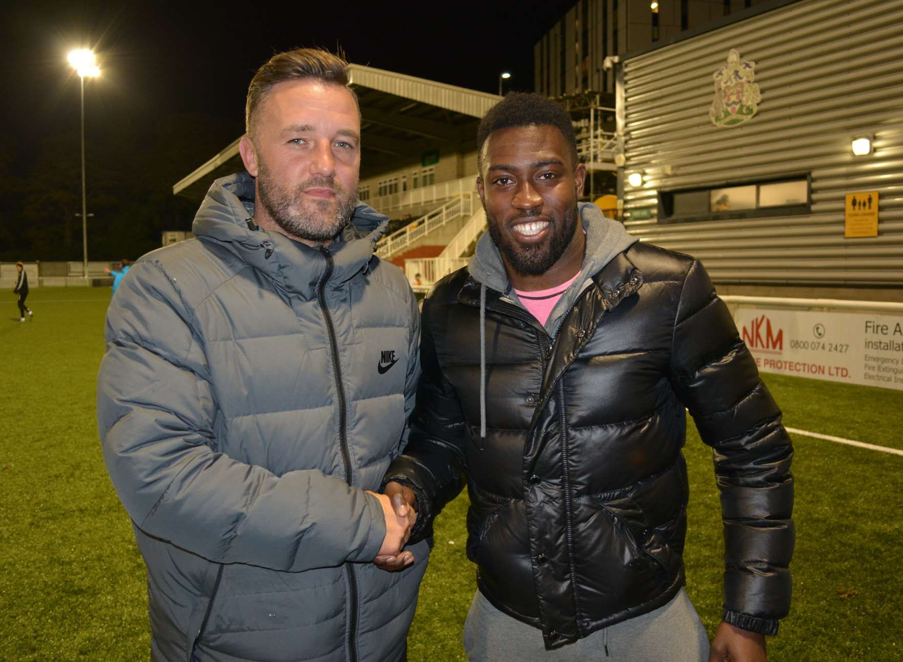 Jay Saunders welcomes Bradley Hudson-Odoi to the Gallagher Picture: MUFC