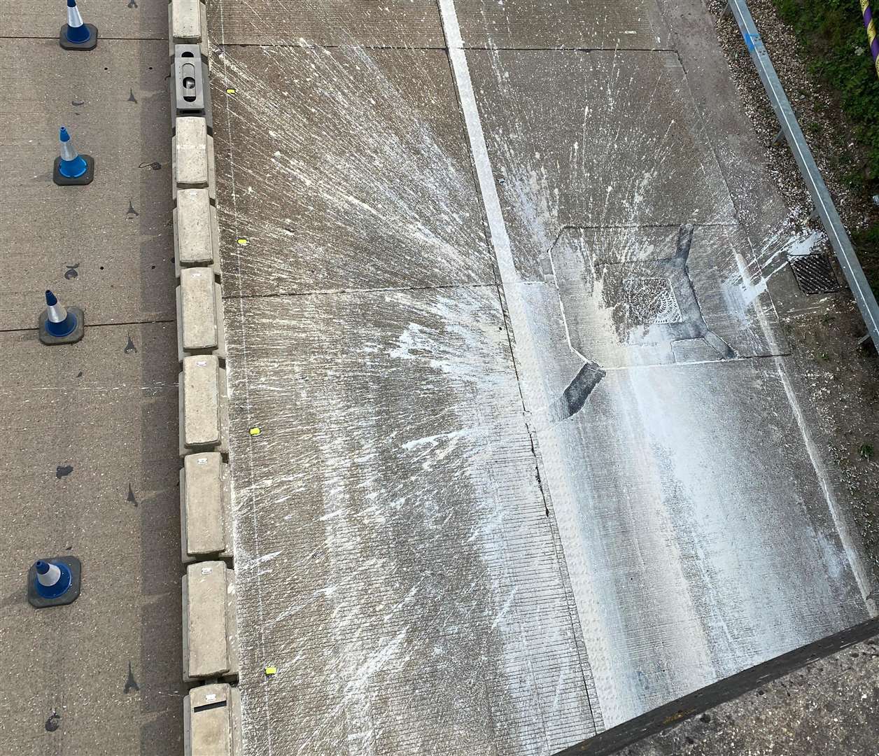 A spillage of white paint has closed a lane of the M20 between Ashford and Maidstone. Picture: National Highways