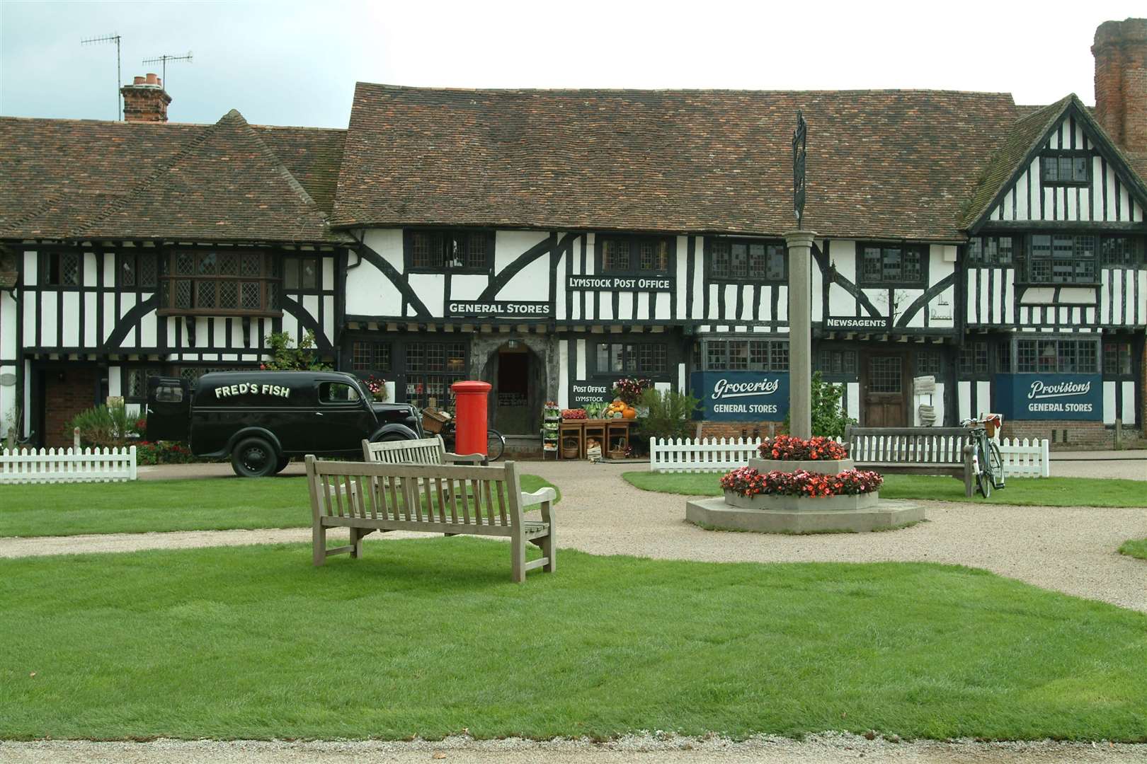 Take away the parked cars, add in some grass and a memorial, and the village square becomes even more picturesque. Here it is pictured for the Miss Marple shoot in 2005