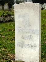 One of the damaged headstones. Picture: JOHN WARDLEY