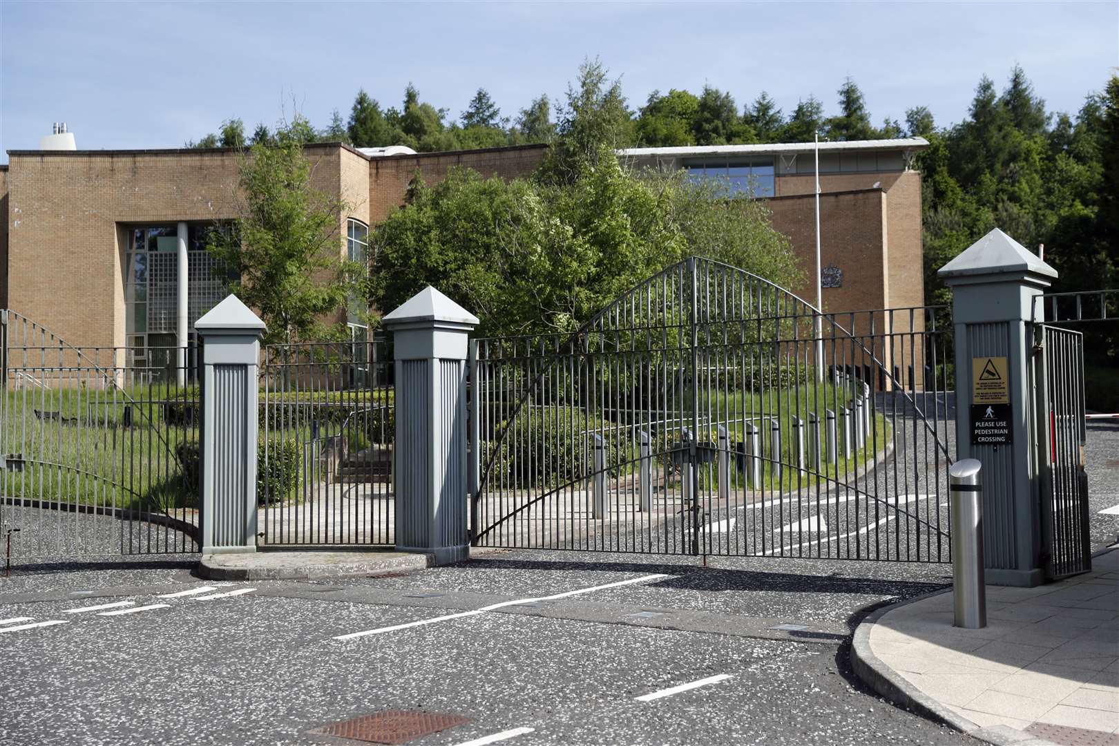 Dungannon Magistrates’ Court, where three men appeared in connection with the shooting of DCI John Caldwell (PA)
