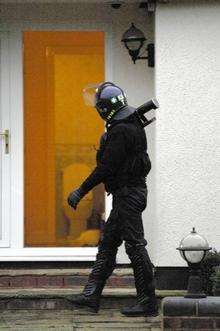 Police launched an early-morning raid on the property in Hastingleigh