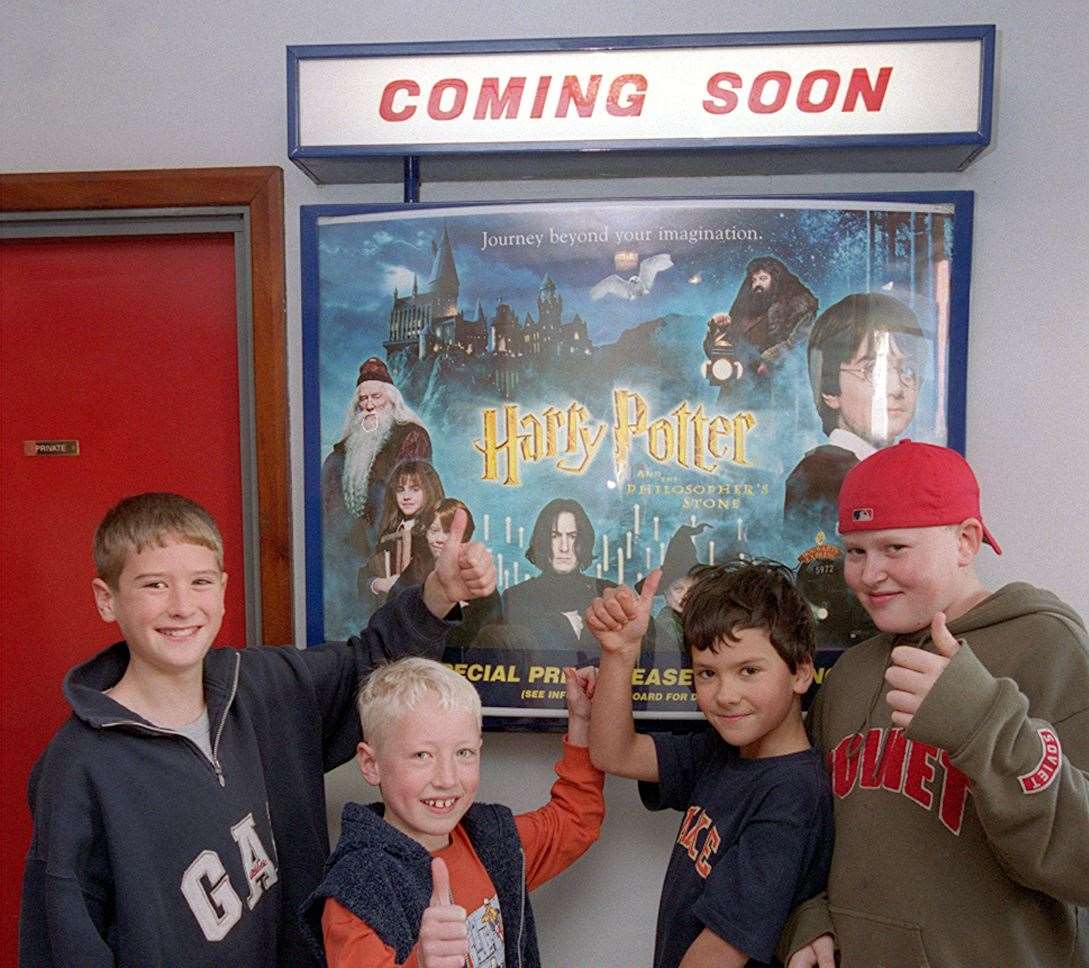 Thumbs up for Harry Potter at the ABC cinema in Canterbury, now Odeon, in November 2001. Pictured: Jamie Di-Biasio Henry Hickson George Di-Biasio and Joe Wickenden