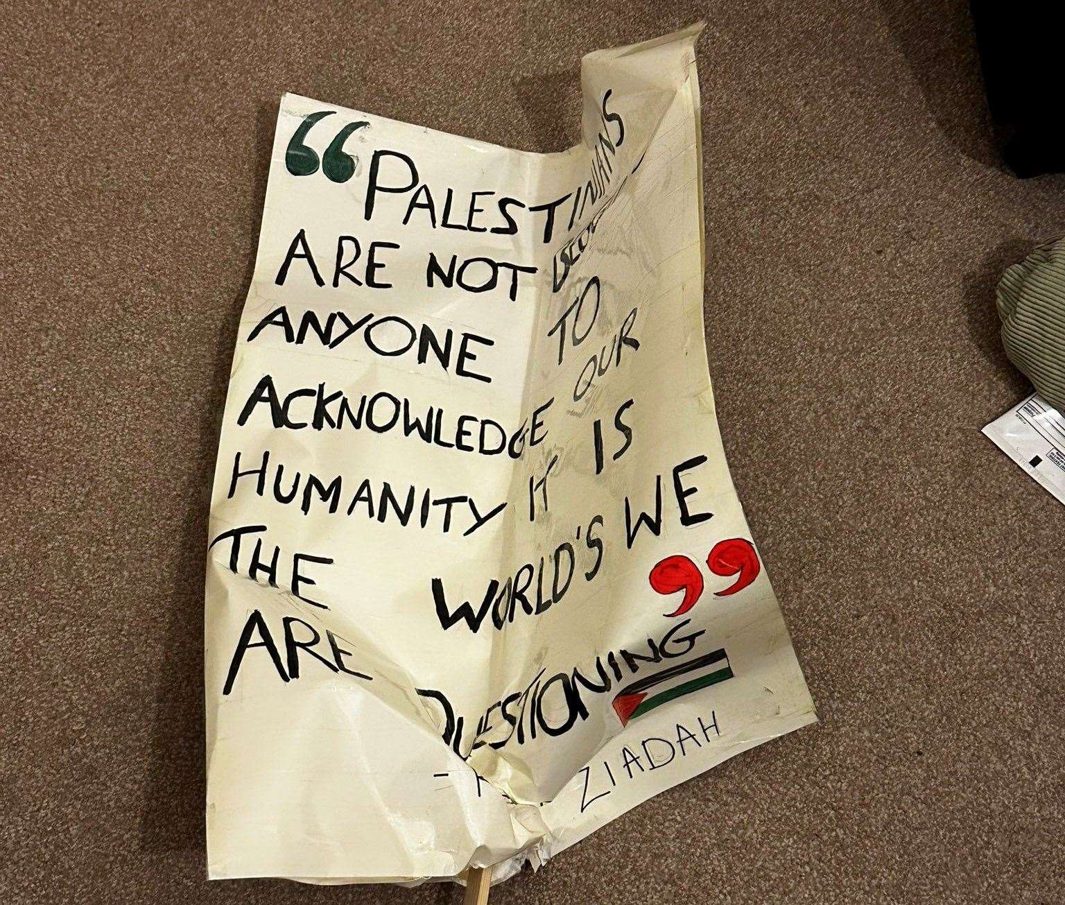The pro-Palestine sign that was screwed up on the train before the reported incident in Folkestone Central Station
