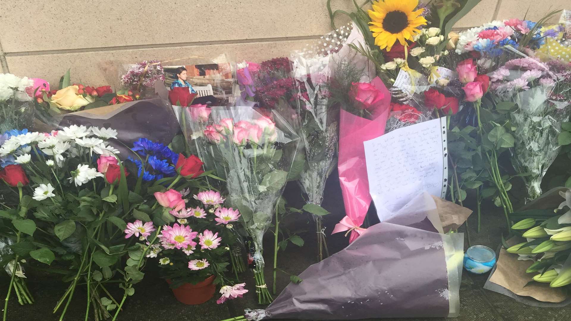 Floral tributes at the scene where Luhana Barros died