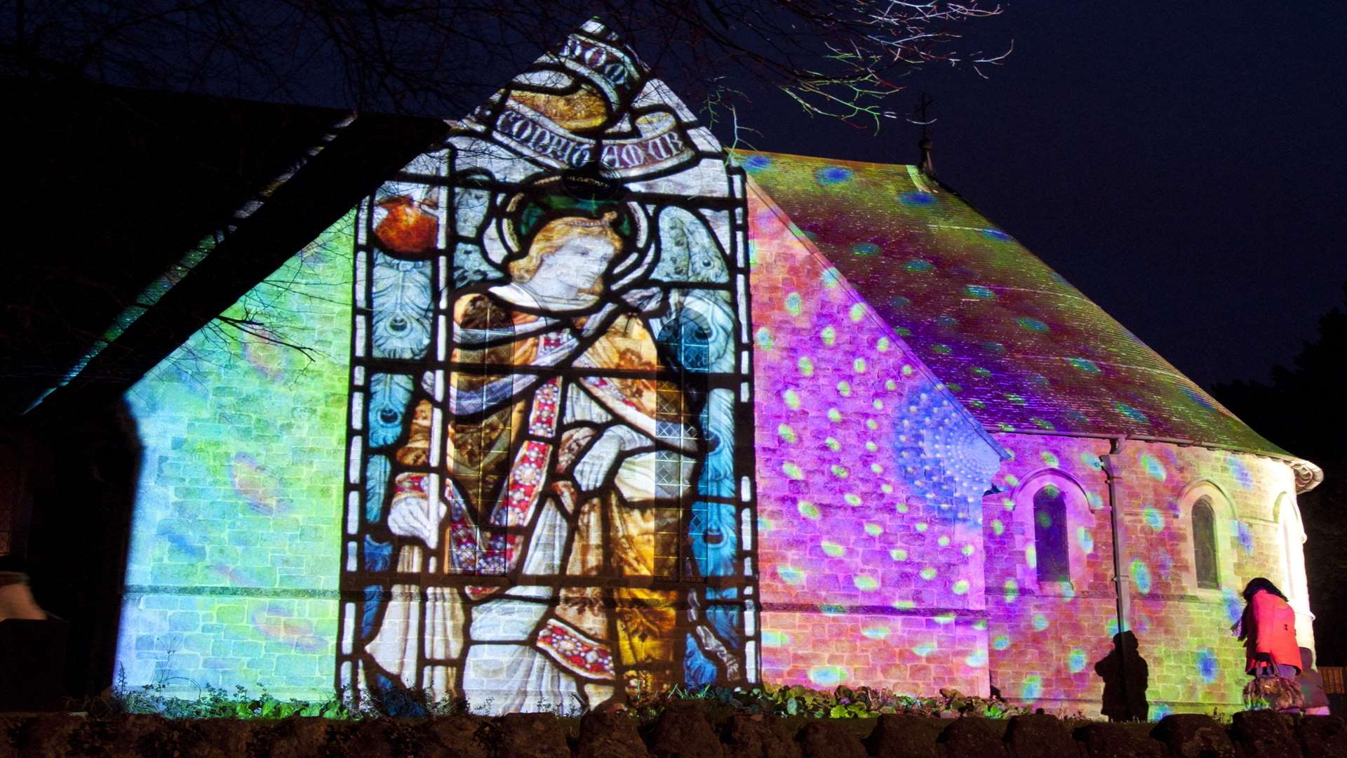 Ross Ashton's artwork Spiritus, projected on to the side of All Souls Church
