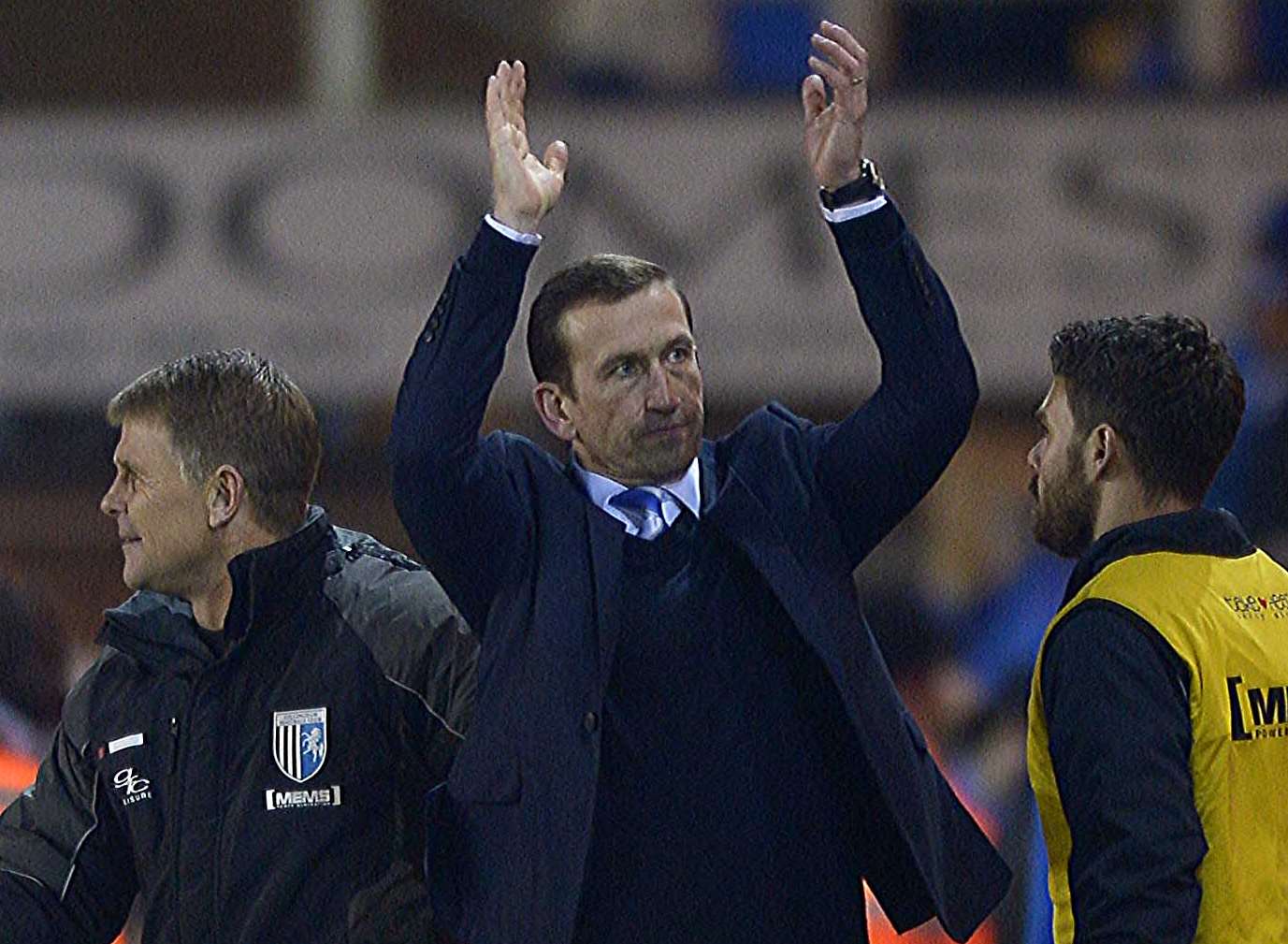 Justin Edinburgh thanks the away fans at Peterborough Picture: Barry Goodwin