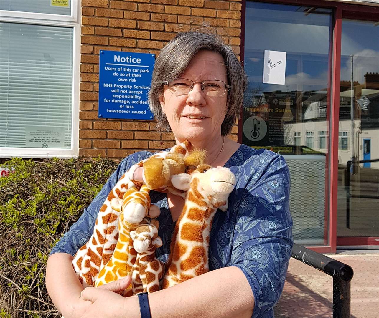 Dr Chandler with some of her famous giraffes