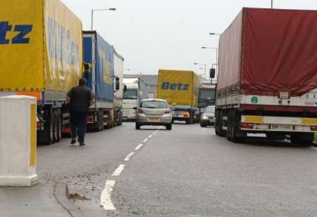 Traffic negotiates foreign lorry drivers camping out at Orbital Park