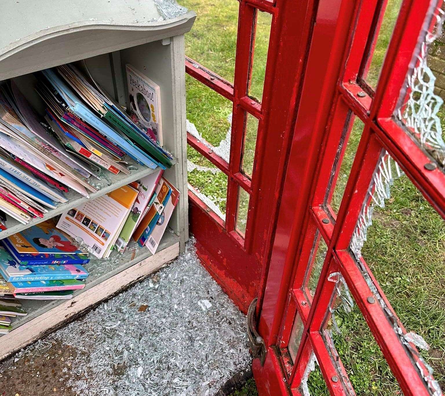 Piles of glass were left covering the books and on the floor. Picture: Cllr Linda Harman