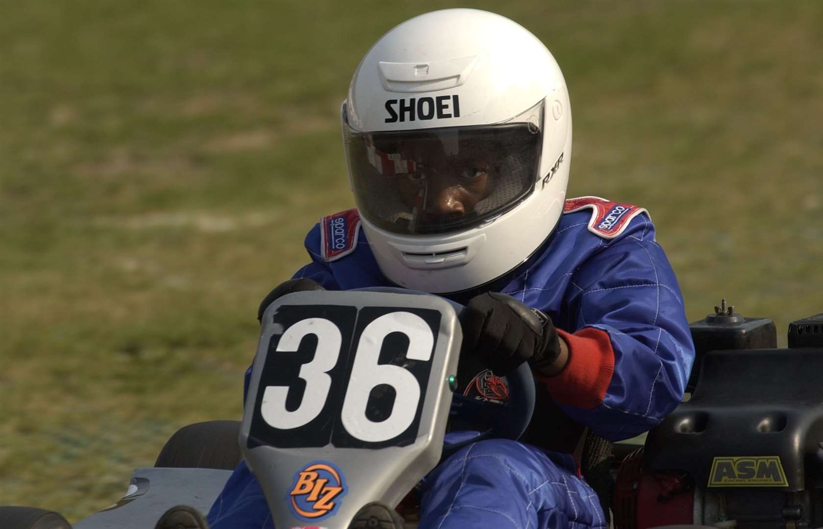 The eyes have it: Fawkham's Justin Bailey concentrates in a Honda Cadet heat in September 2003