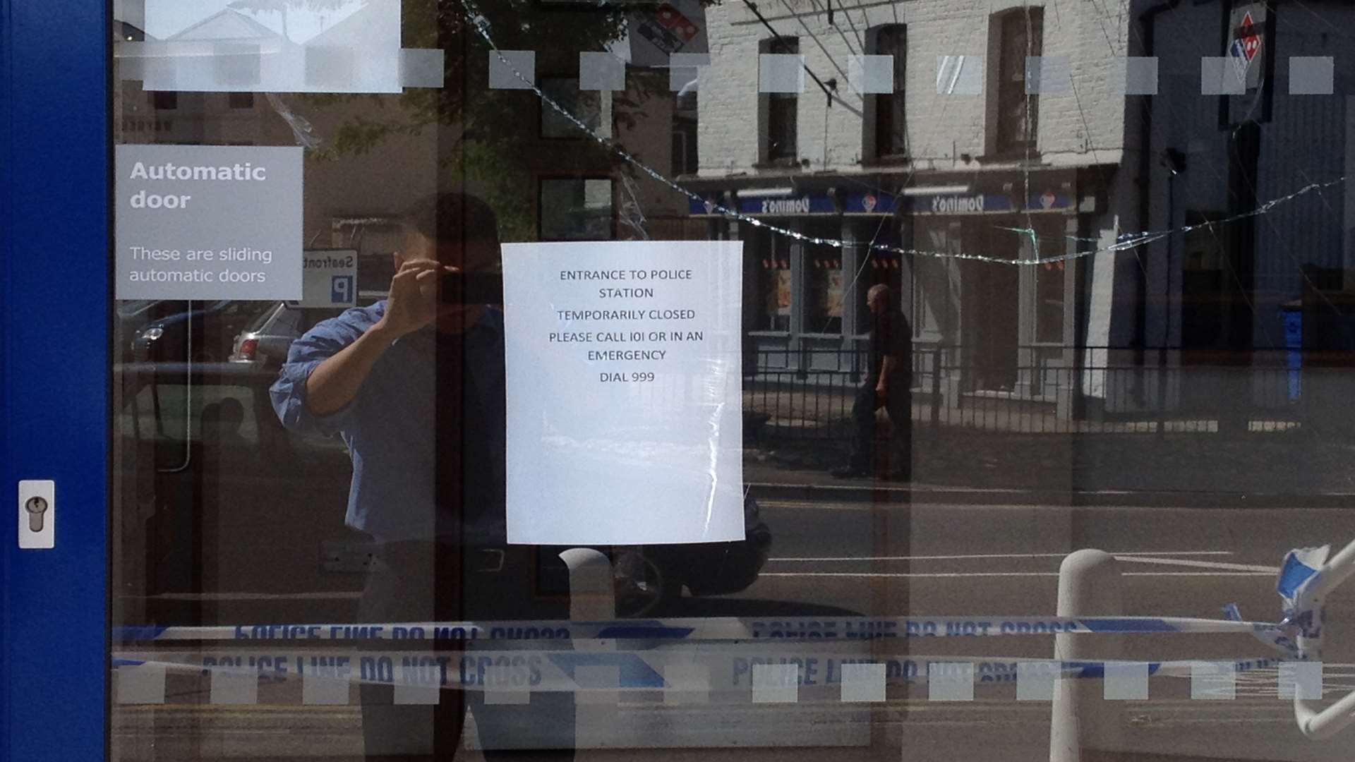 The sign on the window after the vandalism attack at Sheerness police station